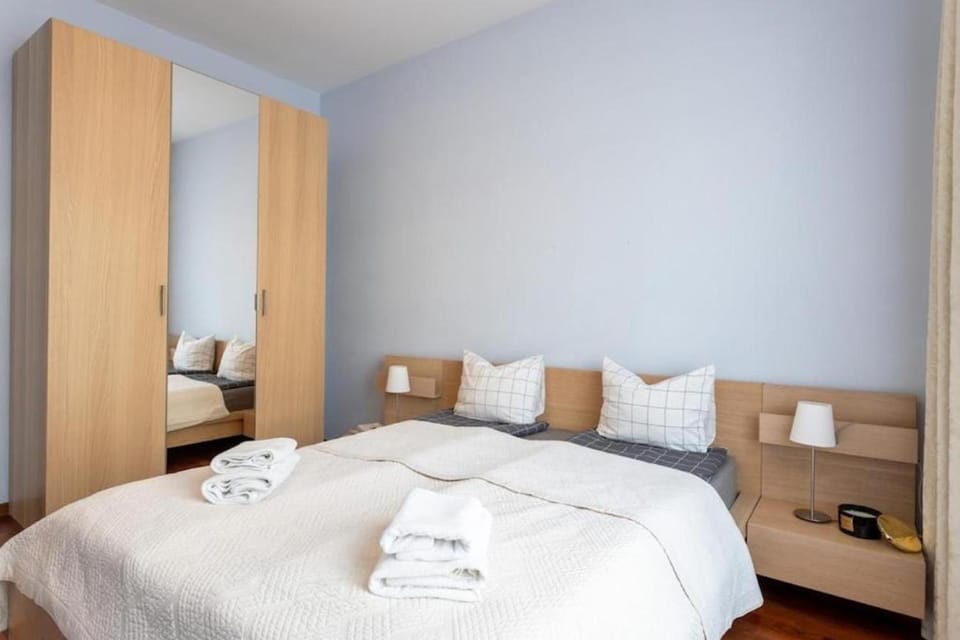 Bed, Seating area, Bedroom, towels, wardrobe