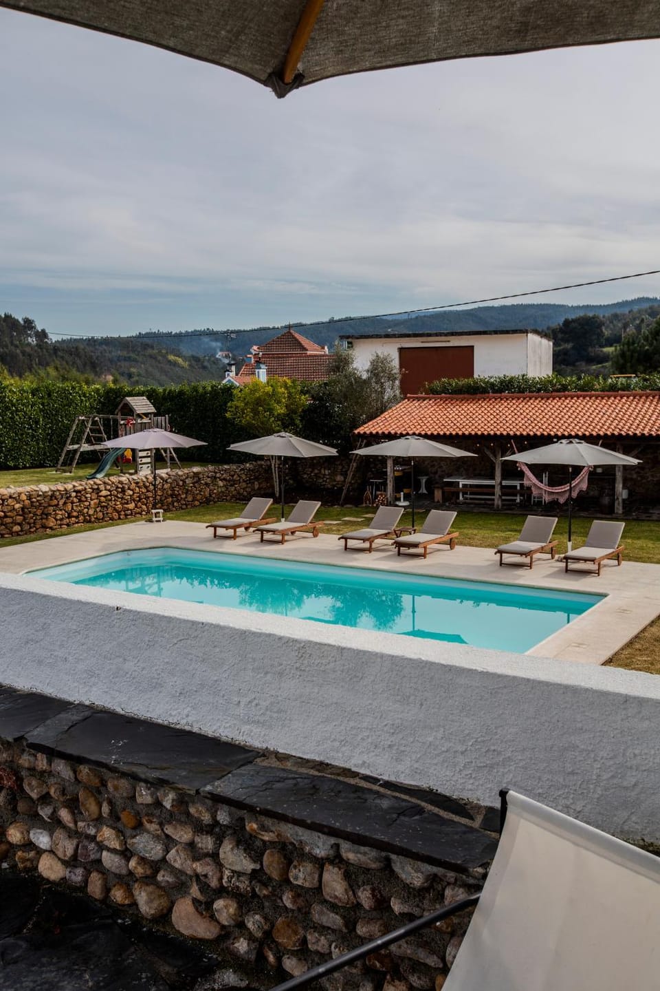 Swimming pool, sunbed