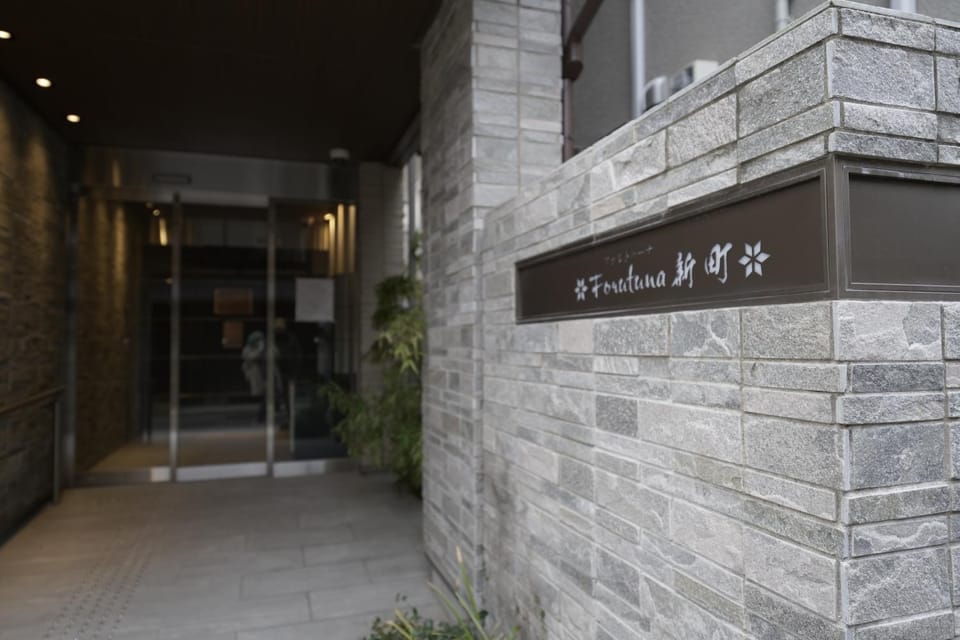 Property building, Facade/entrance, Text overlay
