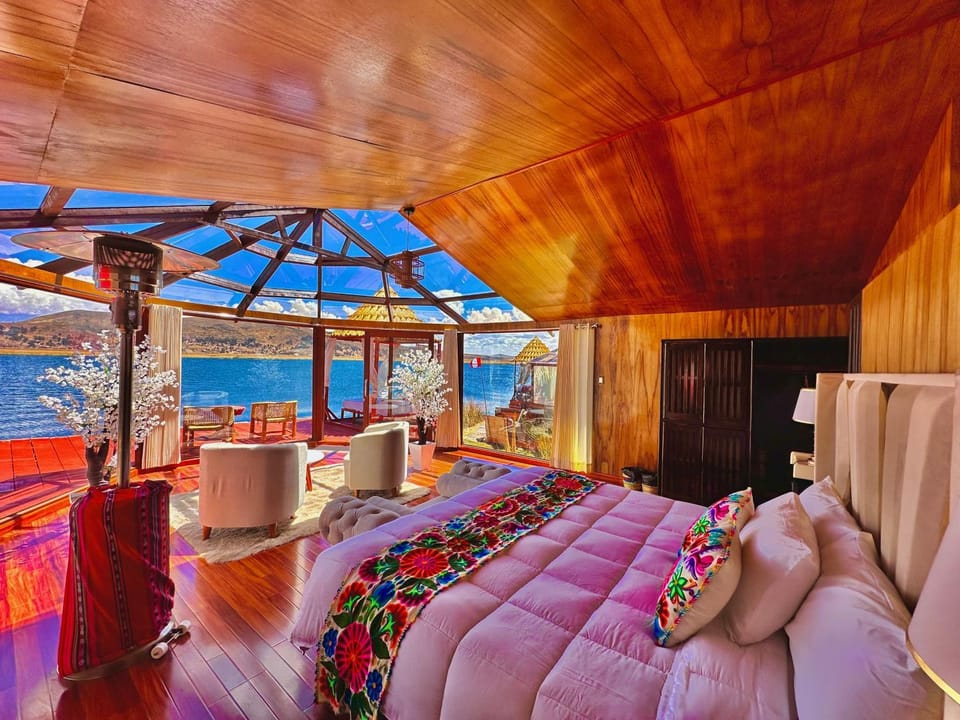 Bed, Natural landscape, View (from property/room), Living room, Seating area, Lake view, Landmark view
