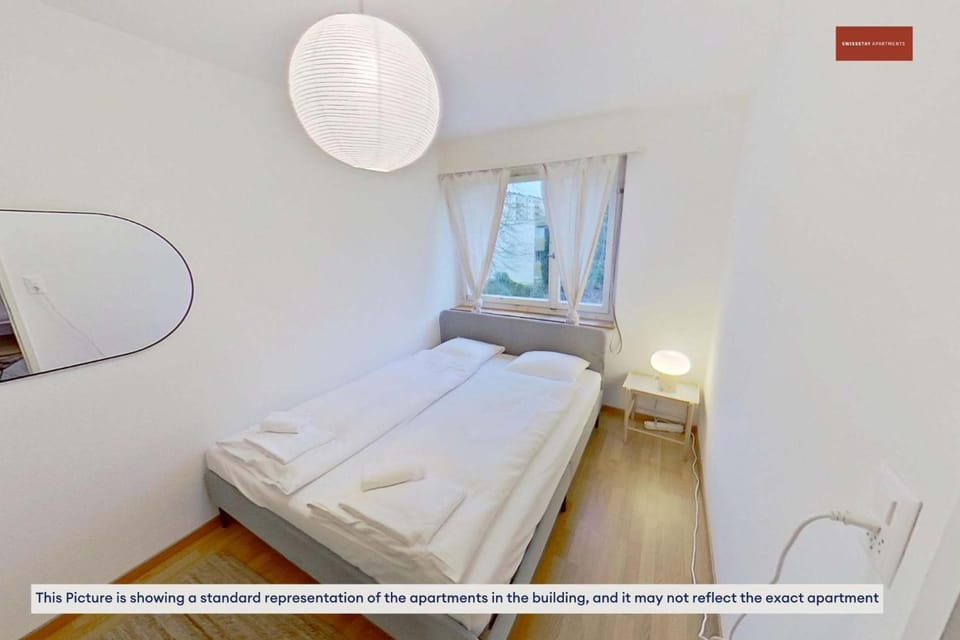 Simple and Warm on Köschenrütistrasse Apartment in Zurich City