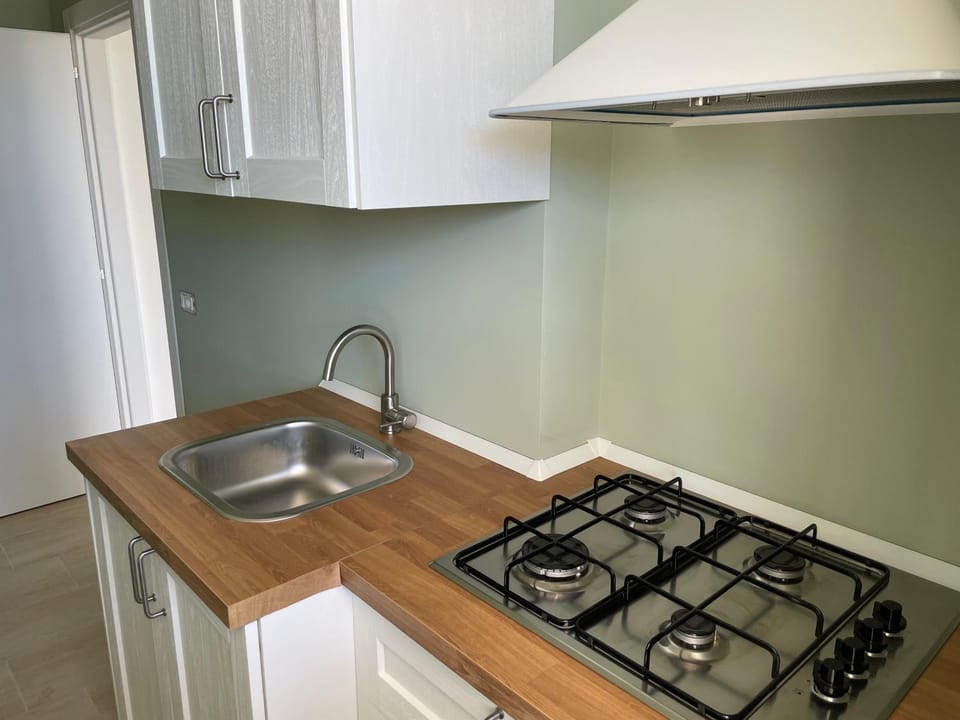 Kitchen or kitchenette, stove