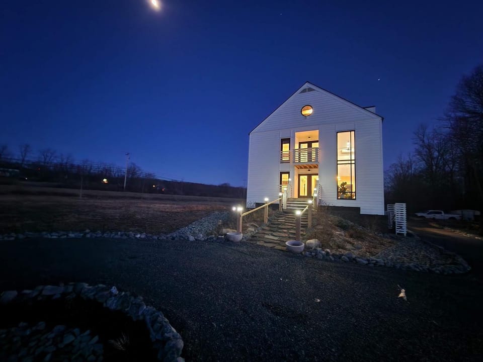 the Sugar Cube, a stunning, spacious, and modern villa with an orchard maze House in Finger Lakes