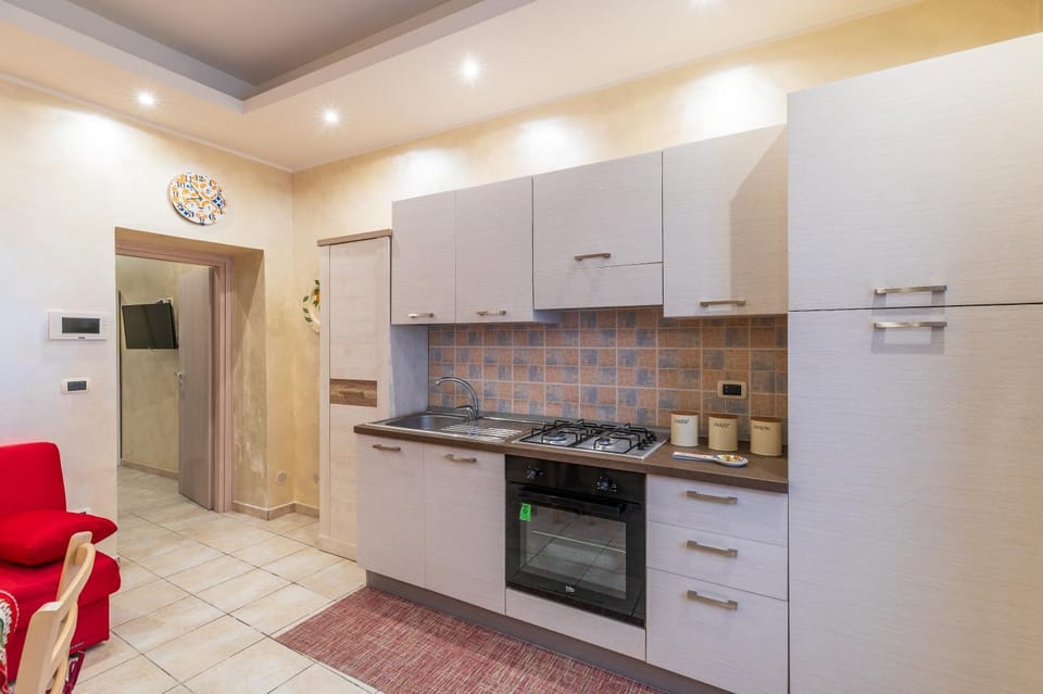 Kitchen or kitchenette, oven, stove