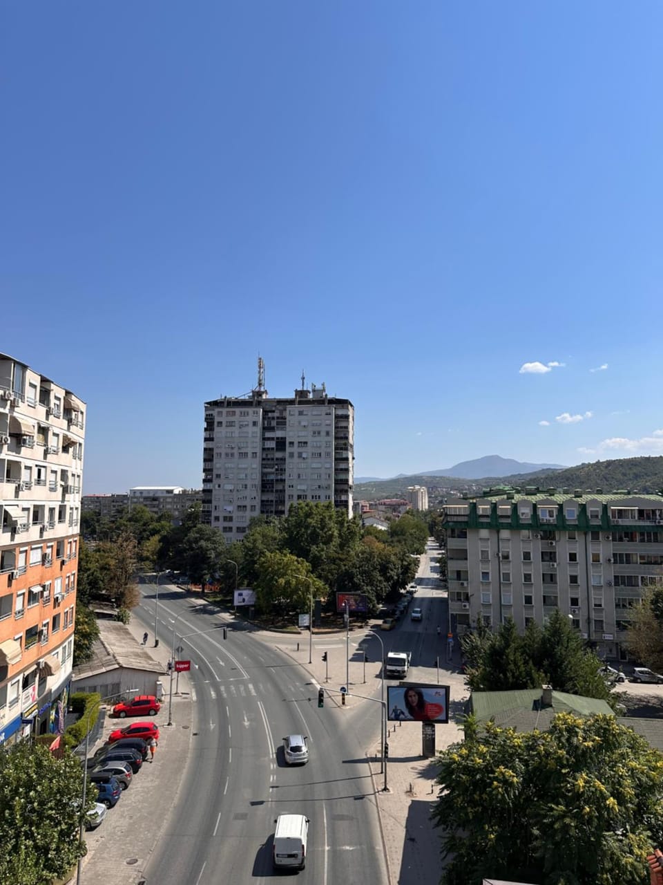 Property building, Day, Neighbourhood, Natural landscape, City view, Mountain view, Street view, Location