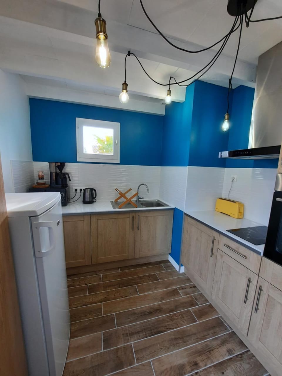 Kitchen or kitchenette, oven, stove, toaster