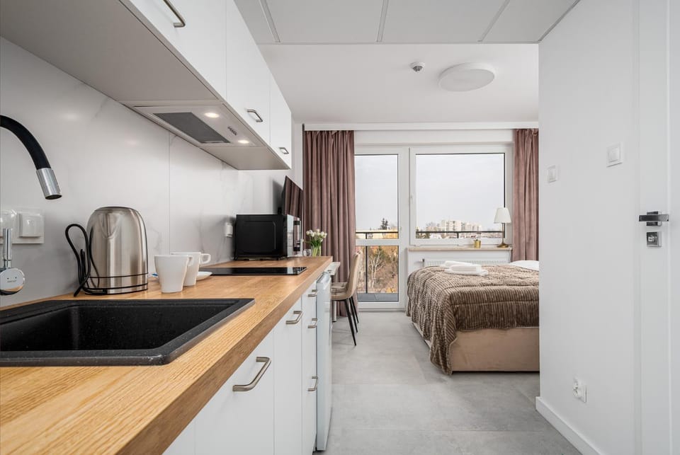 Bed, TV and multimedia, Coffee/tea facilities, Kitchen or kitchenette, Photo of the whole room, Bedroom, stove