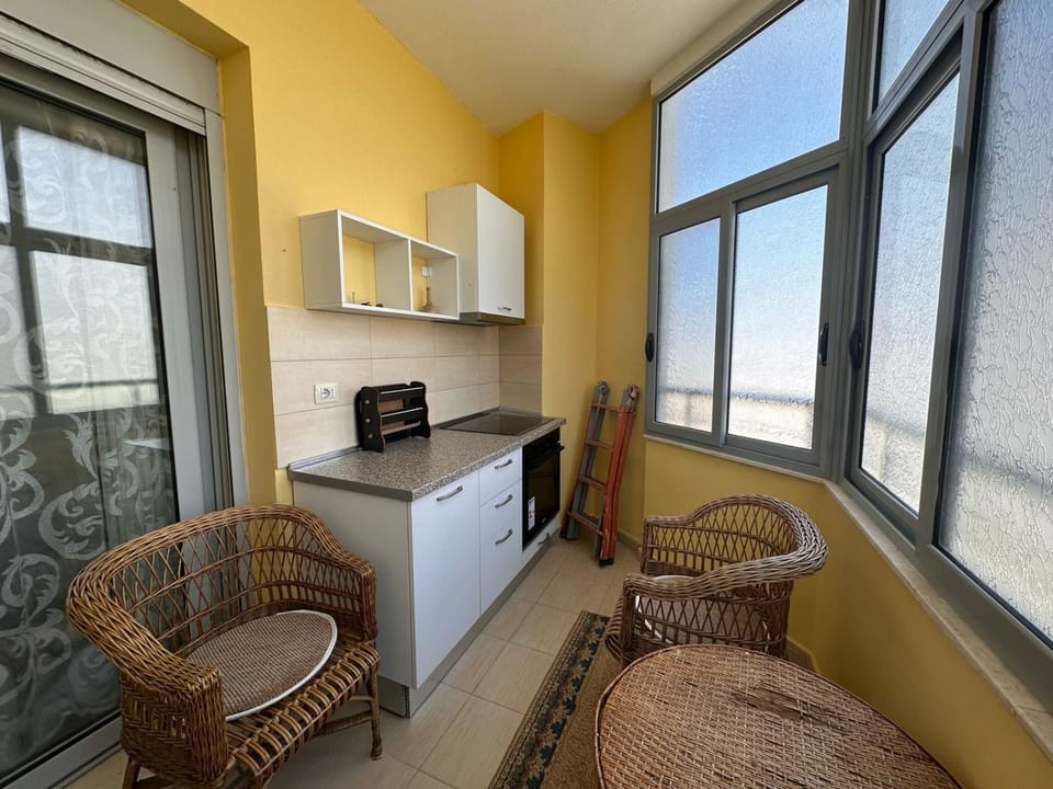 Kitchen or kitchenette, oven, stove