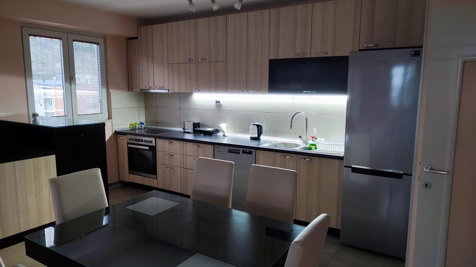 Kitchen or kitchenette, Living room, Dining area, dishwasher, oven, stove, toaster, kitchen, air conditioner