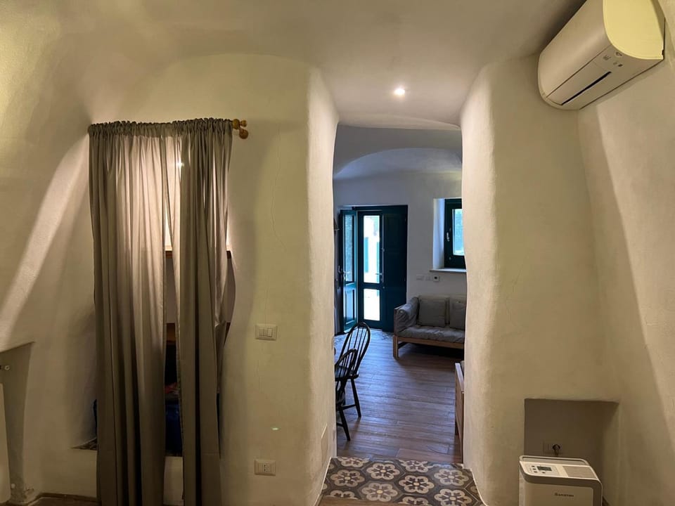 Bed, Living room, Seating area, Bedroom, air conditioner