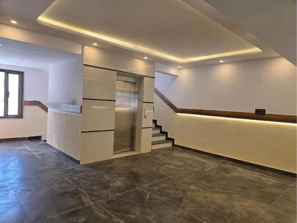 Property building, elevator