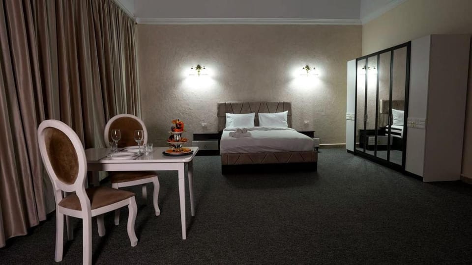 Bed, Living room, Photo of the whole room, Seating area, Bedroom, hair dresser, wardrobe
