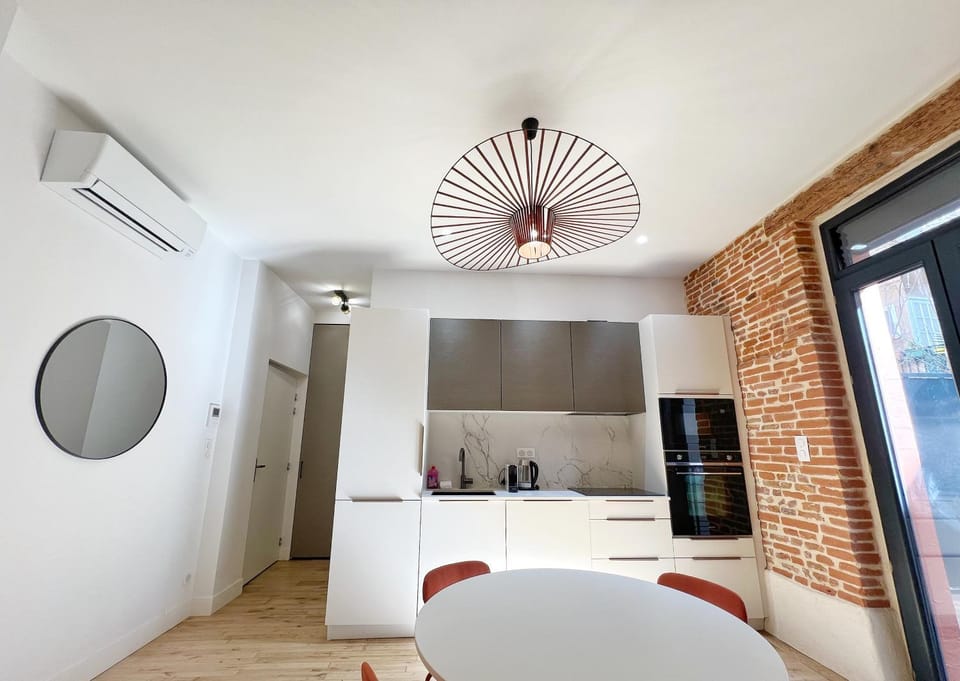 Dining area, stove, air conditioner
