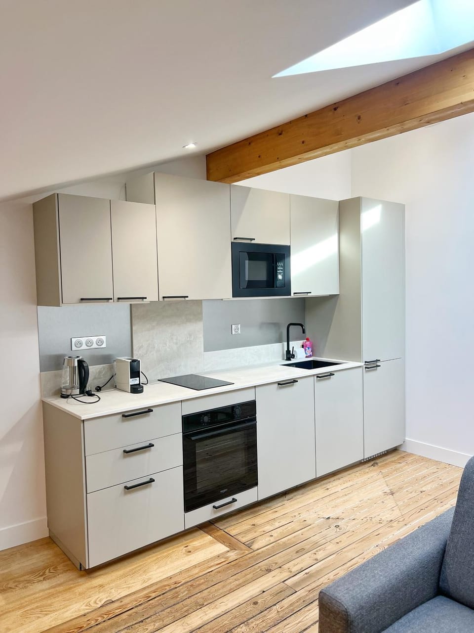 Kitchen or kitchenette, dishwasher, oven, stove