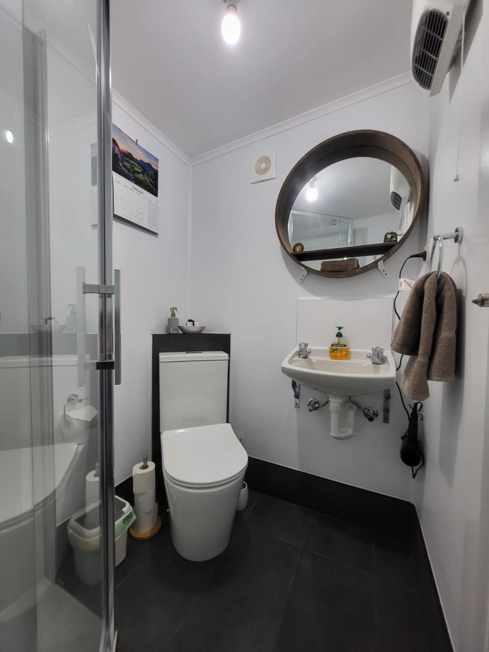 Shower, Toilet, Bathroom, hair dryier, towels