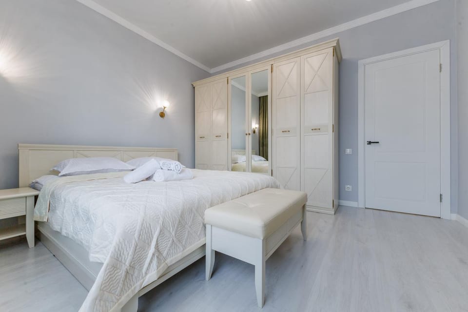 Bed, towels, wardrobe