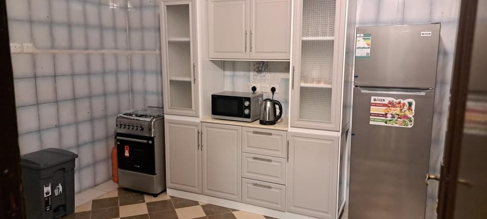 Kitchen or kitchenette, oven