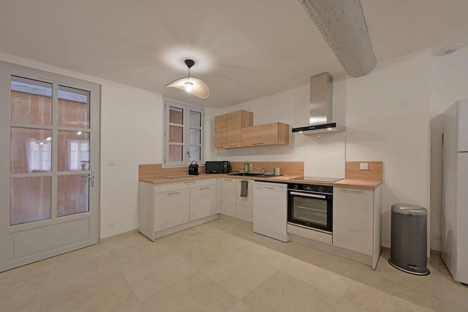 Kitchen or kitchenette, dishwasher, oven, stove, toaster