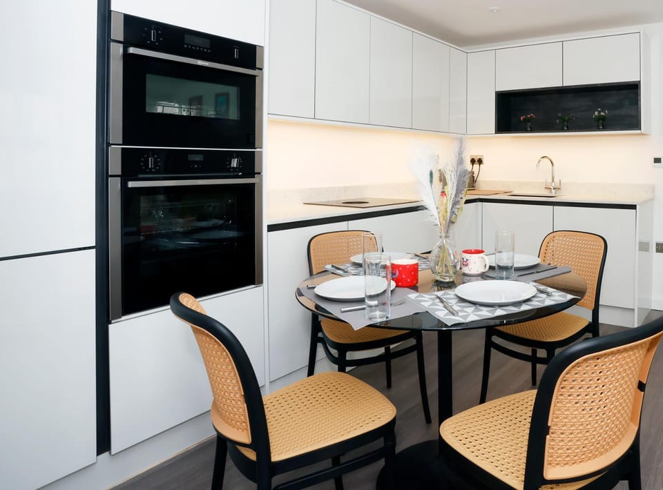 Dining area, dishwasher, microwave, oven, stove, toaster, kitchen
