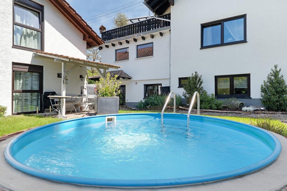 Property building, Living room, Swimming pool
