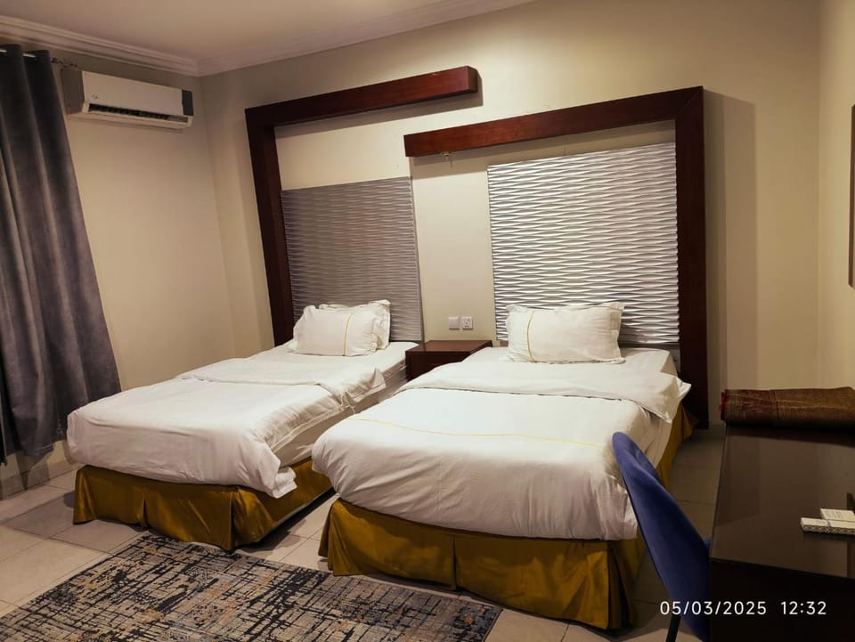 Bed, Photo of the whole room, Bedroom, towels, air conditioner