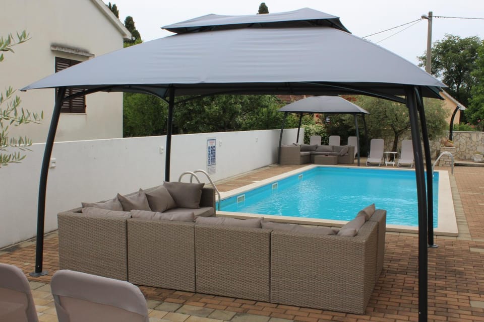 Patio, Day, Pool view, Swimming pool, sunbed