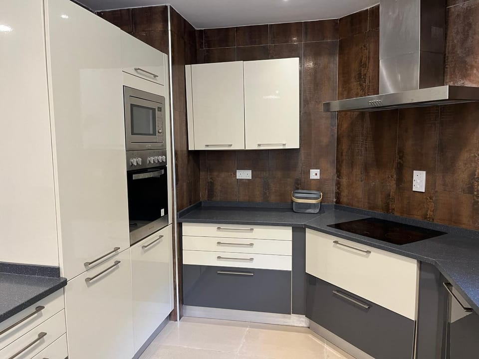 Kitchen or kitchenette, oven, stove