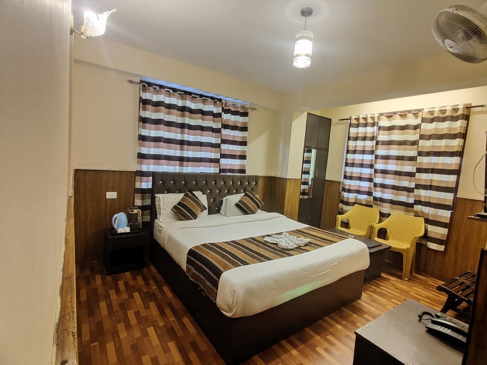 KG Tusheta - 200 mtrs from MG Marg Hotel in India