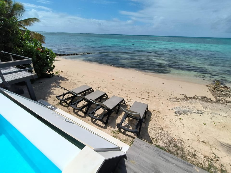 Day, Natural landscape, Beach, Pool view, Sea view, Swimming pool, sunbed