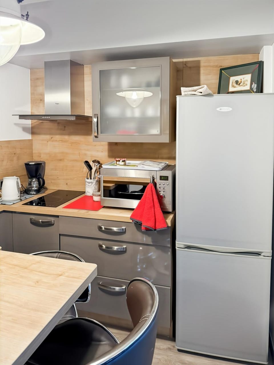Kitchen or kitchenette, dishwasher, oven, stove, toaster