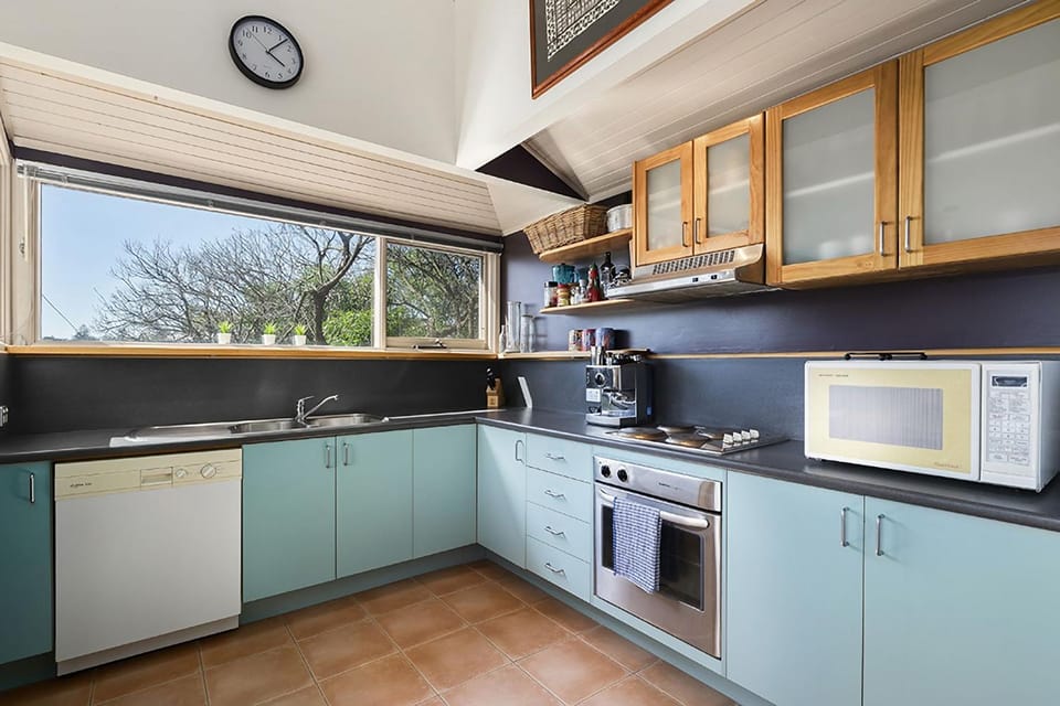 Kitchen or kitchenette, dishwasher, oven, stove