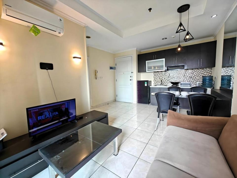 Strategic 2BR Gading MOI Apt with Wi-Fi, Pool & Gym by 2ndHome Apartment in Jakarta
