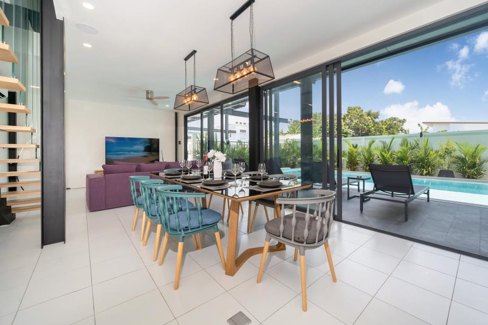 Day, View (from property/room), Living room, Seating area, Dining area, Pool view, Swimming pool