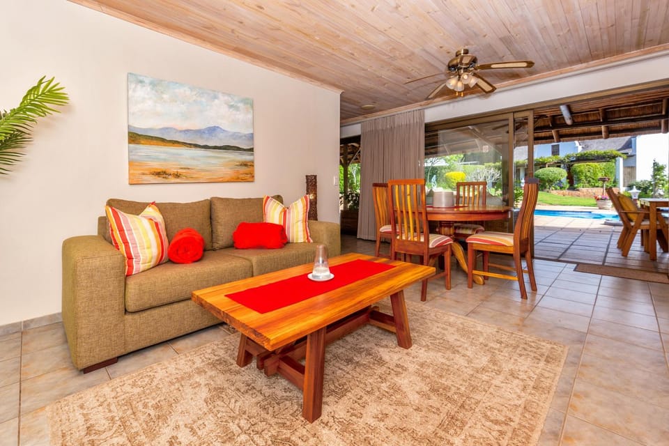 Patio, Living room, Seating area, Dining area, Pool view, Swimming pool