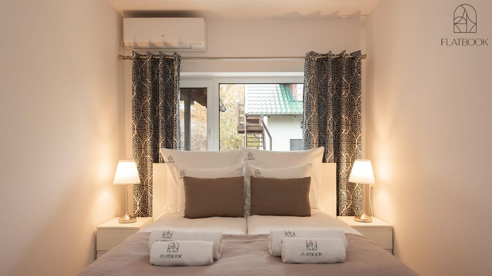 Bed, Photo of the whole room, Bedroom, towels, air conditioner