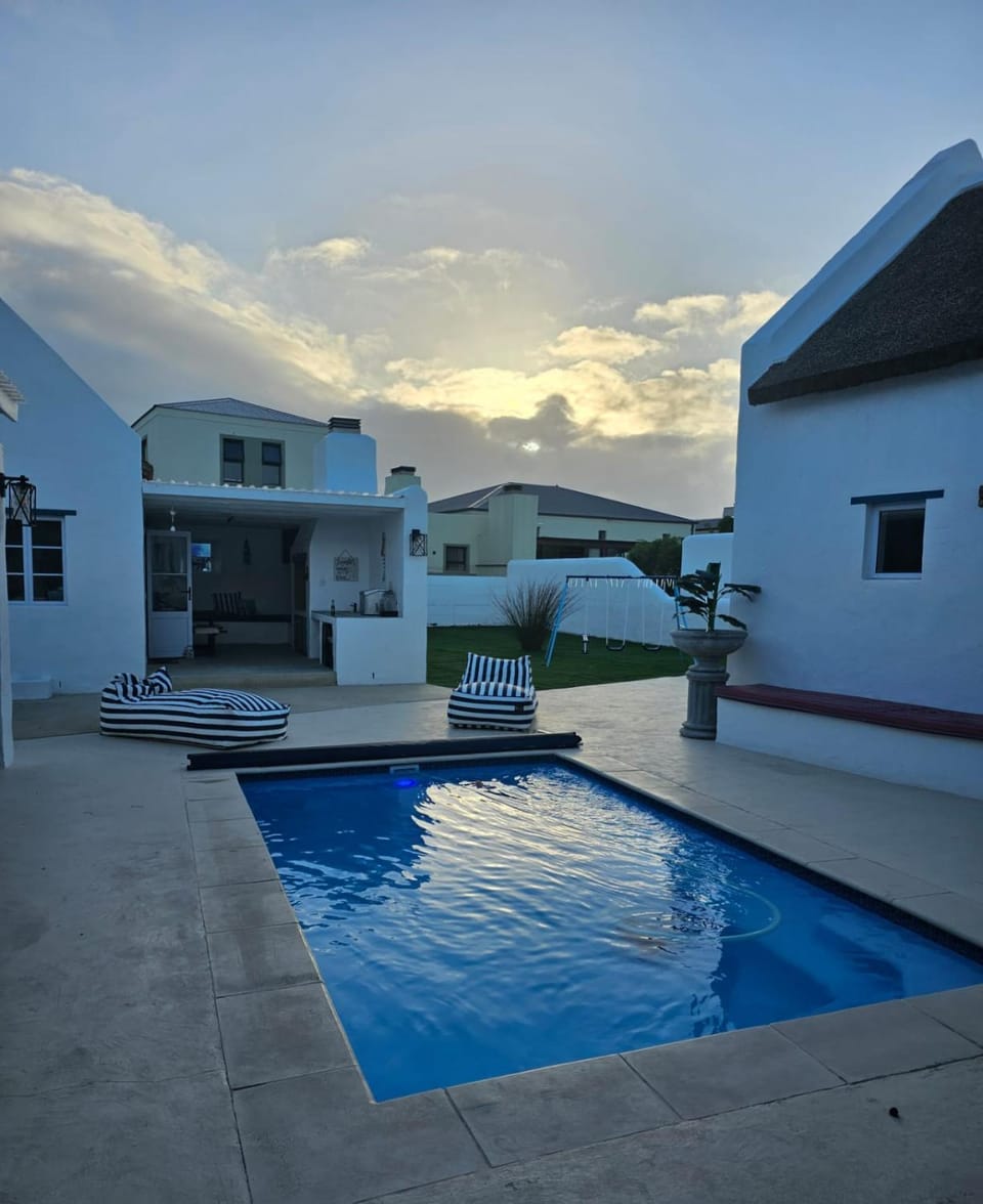 Property building, Children play ground, Garden, Pool view, Swimming pool, group of guests, sunbed