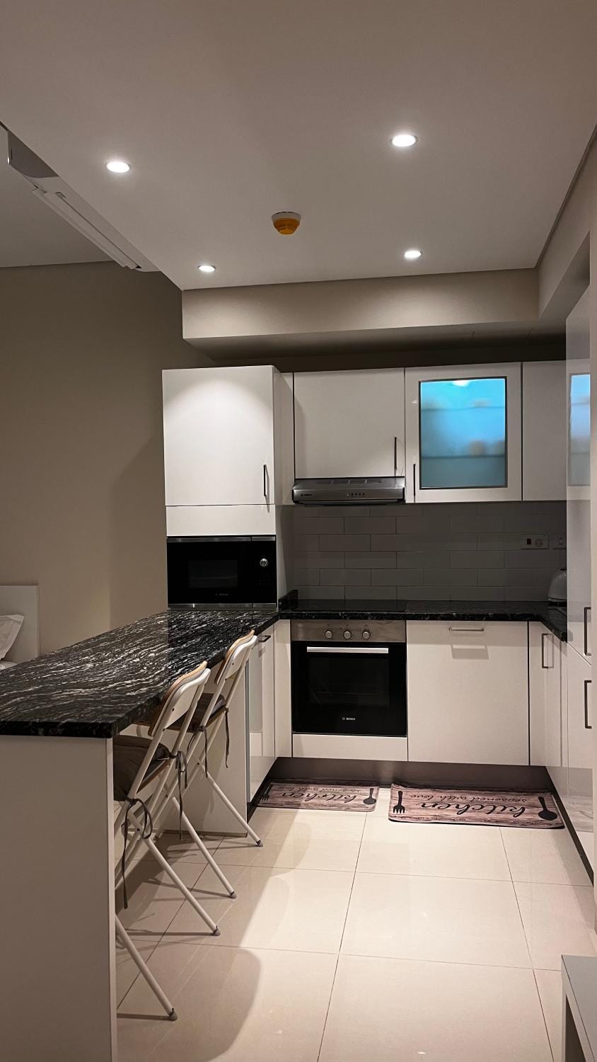 Kitchen or kitchenette, Dining area, dishwasher, oven