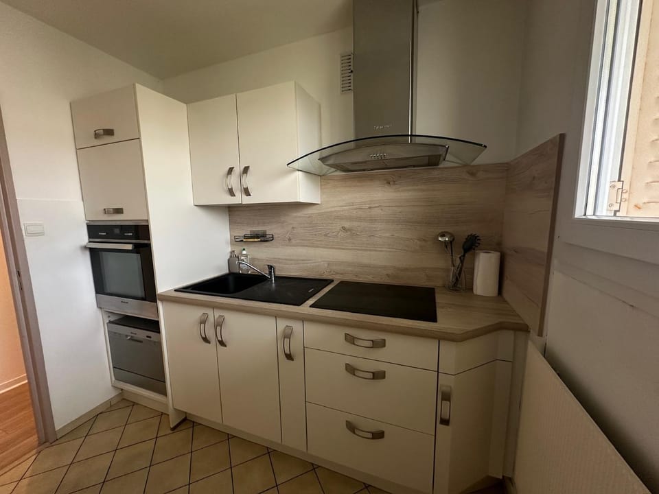 Kitchen or kitchenette, stove