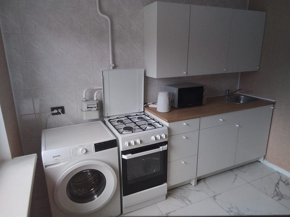 Kitchen or kitchenette, stove