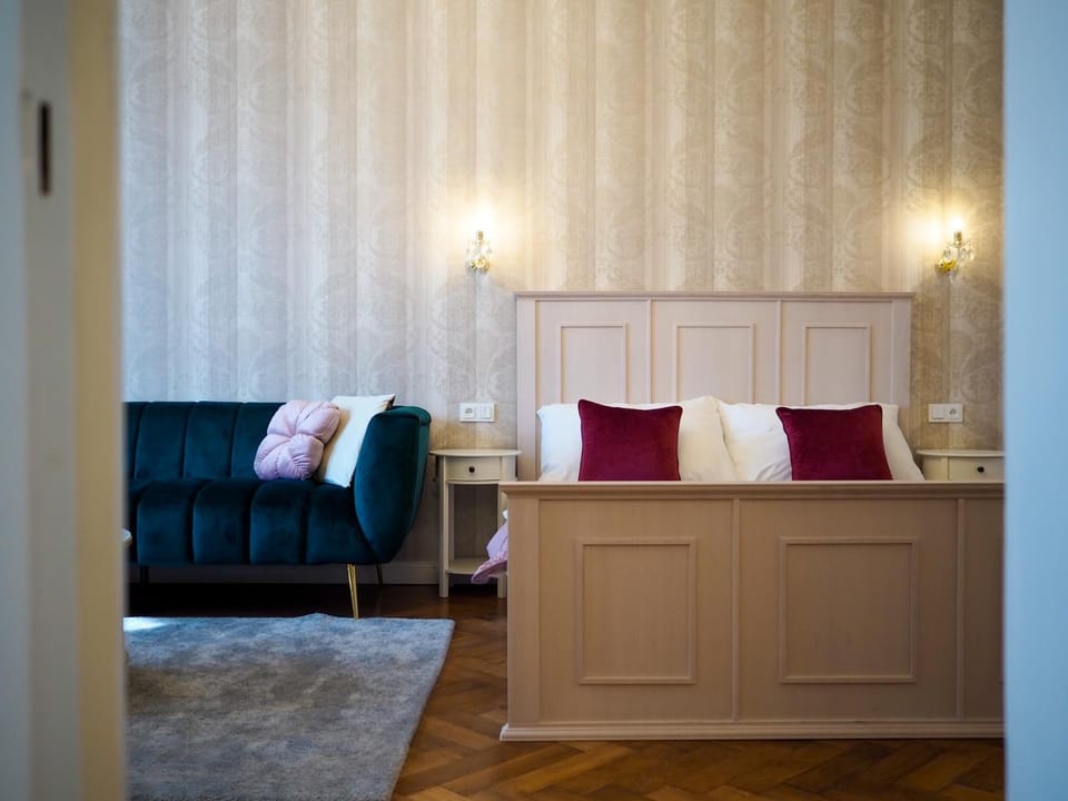 Bed, Living room, Seating area, Bedroom