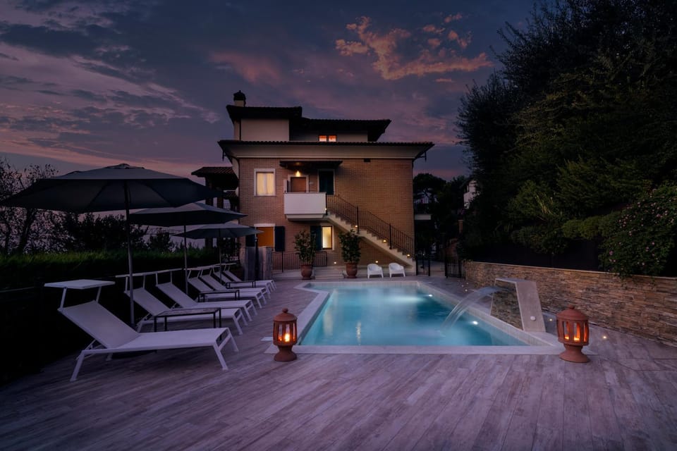 Property building, Night, Natural landscape, Solarium, View (from property/room), Pool view, Swimming pool, Sunset, sunbed