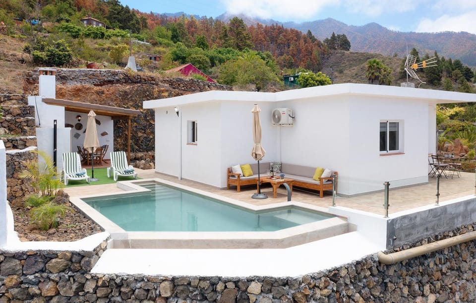 Property building, Living room, Swimming pool
