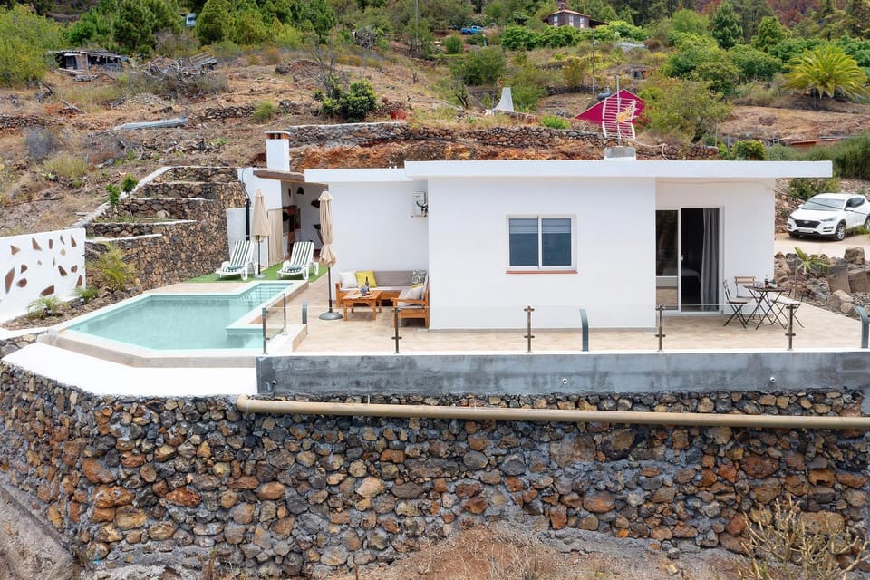 Property building, Living room, Swimming pool