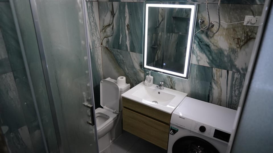 Bathroom, towels, washing machine