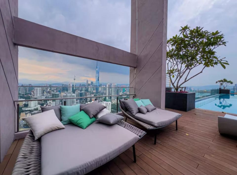 View (from property/room), Seating area, City view, Pool view, Swimming pool, sunbed