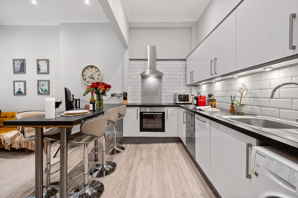 Kitchen or kitchenette, Dining area, dishwasher, oven, stove, toaster