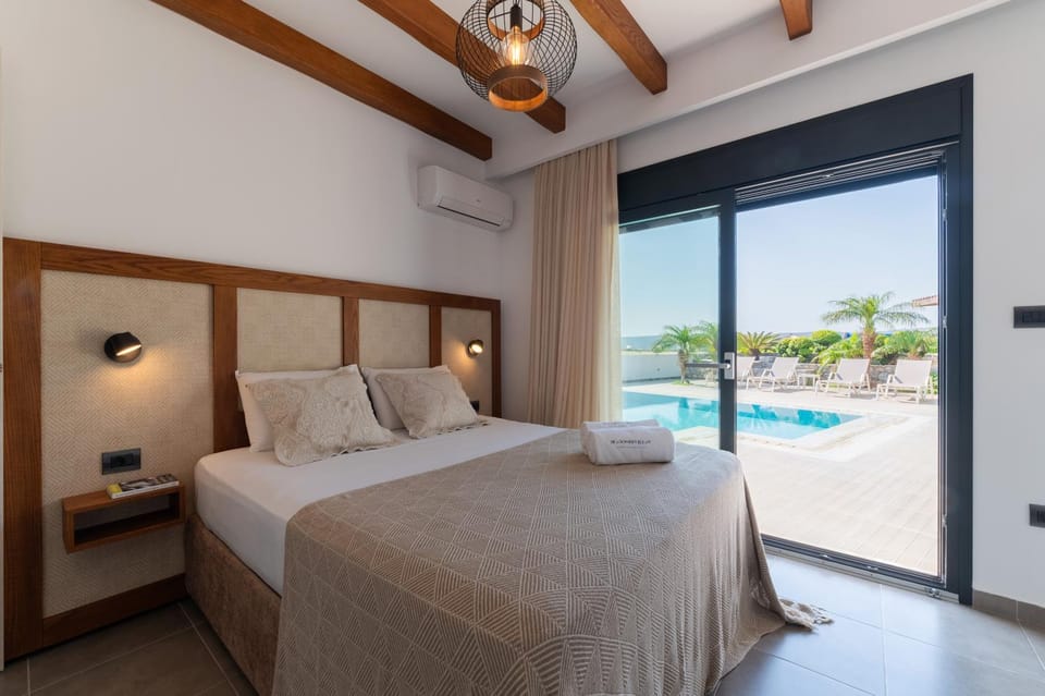 Bed, Natural landscape, Bedroom, Pool view, Swimming pool, sunbed