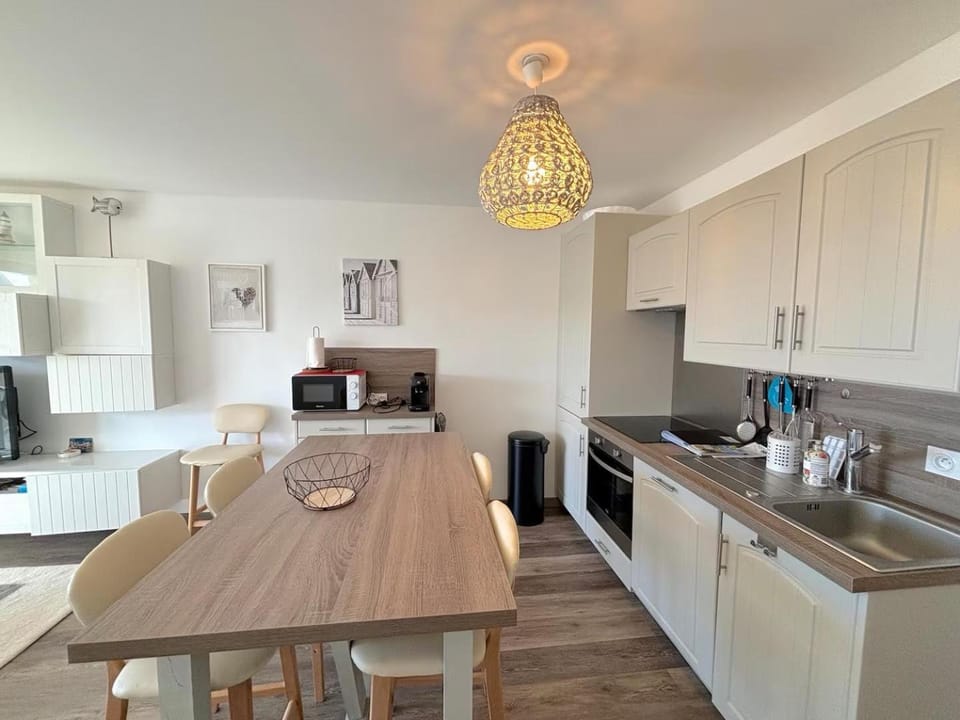 Dining area, dishwasher, oven, stove, toaster, kitchen
