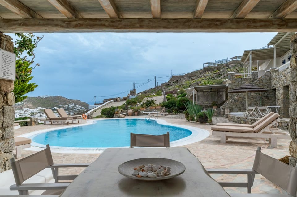 Property building, Living room, Swimming pool