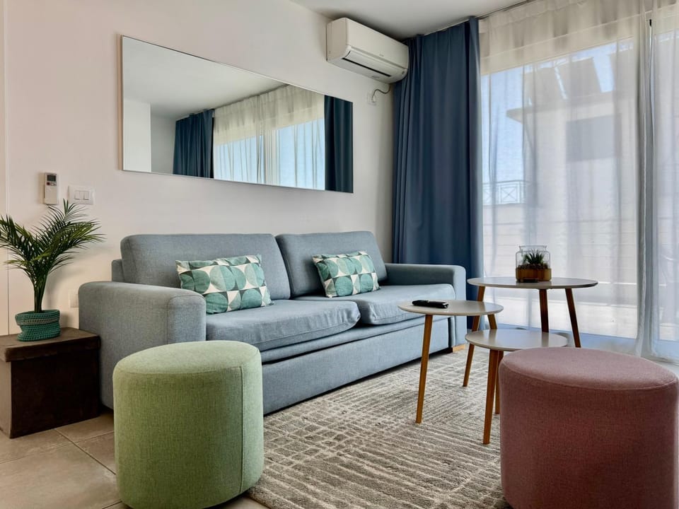 Living room, Seating area, Sea view, air conditioner